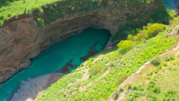 Aerial Top View on Lot of Driftwood in Bluer River on Aksu Canyon in AksuZhabagly Nature Reserve