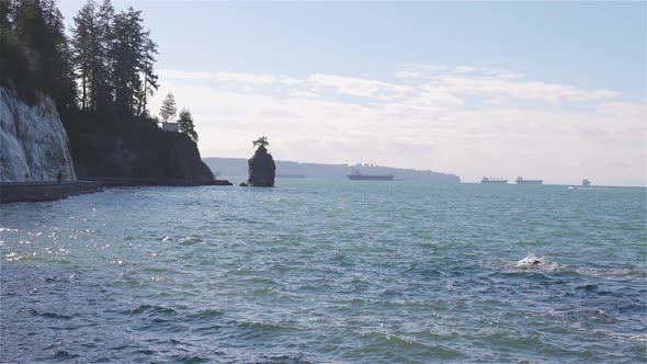 Seawall in Stanley Park and the Famous Siwash Rock