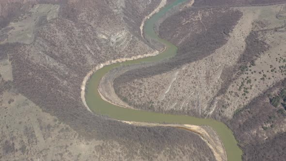 Meander of River Timok by early spring 4K aerial video