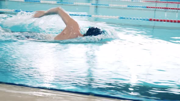 Close Up Shot of a Swimmer Training in a Pool