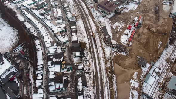 Aerial view of train moving in industrial area