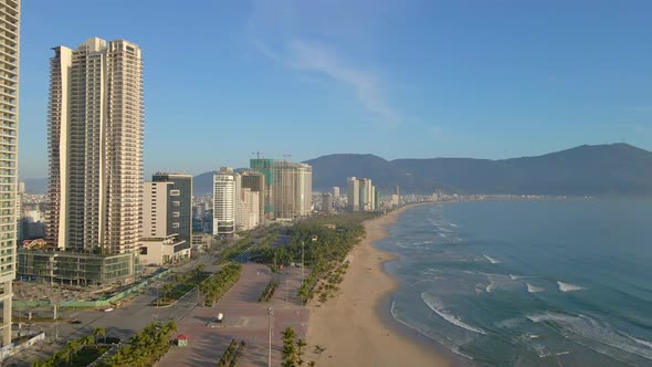 Aerial Slowmotion Shot of the Coastal Part of the City of Danang in Central Vietnam