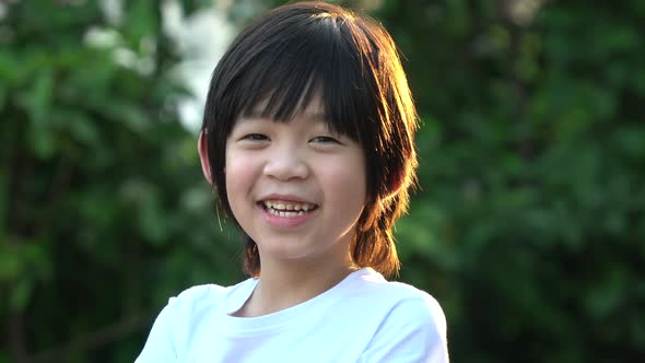 Happy Asian Child Smiling Outdoor