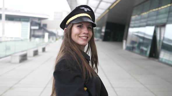 Happiness Lifestyle Portrait of Young Attractive Woman Pilot Dancing