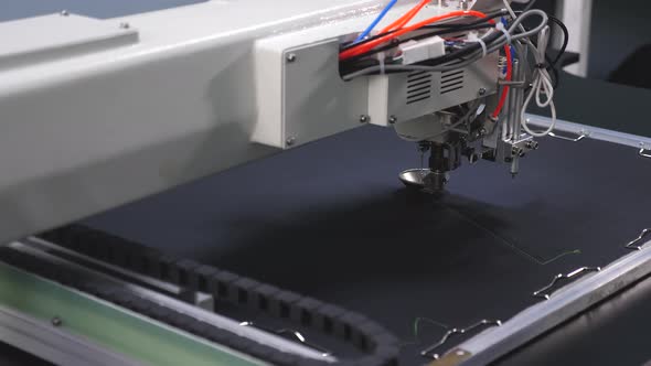 Automatic Sewing Machine. Robot Sewing Machine