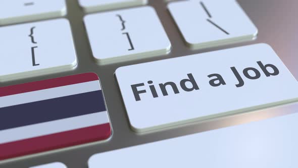 FIND A JOB Text and Flag of Thailand on the Keyboard