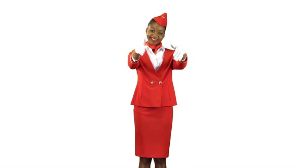 Stewardess in White Gloves Gestures Showing Where the Emergency Exit Is. Alpha Channel