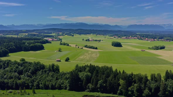 Wide alps mountain shot of a drone with the view over a beautiful landscape, place to be for holiday