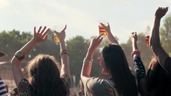 Rear view of people having good time in festival