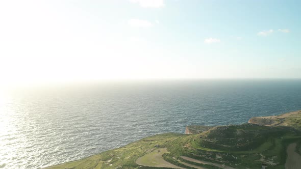 AERIAL: Flying Very High Above Greenery Hills in Malta