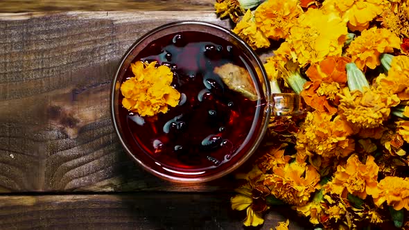 Antioxidant Natural Tea From Marigold Flowers From Above, Tea For Colds. Naturotherapy Medicinal