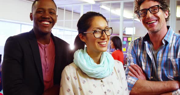 Portrait of business executives smiling at camera