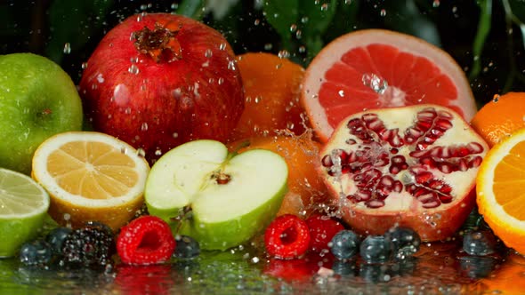 Super Slow Motion Shot of Pouring Water on Variation of Fruits at 1000Fps