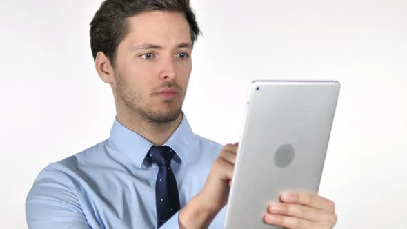 Young Businessman Using Tablet on White Background