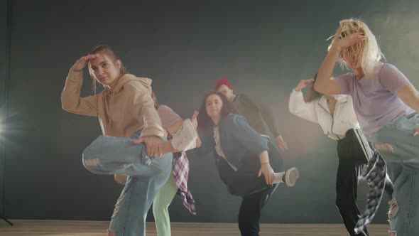 Portrait of Teenage Dancers Practicing Dance Then Standing Together and Looking at Camera