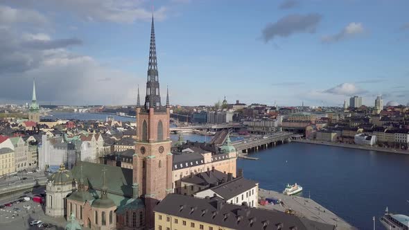 Aerial Parallax around Old Church. Aerial shot of Riddarholmen Church, Stockholm, Sweden