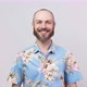 Portrait of a smiling man wearing hawaiian shirt over white background - VideoHive Item for Sale