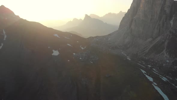 Aerial Fly near Passo Giau in Dolomites Italy at Sunset