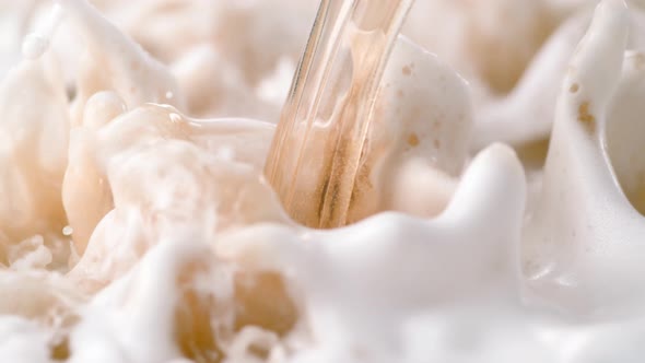 Beer pouring and bouncing. Slow Motion. alt