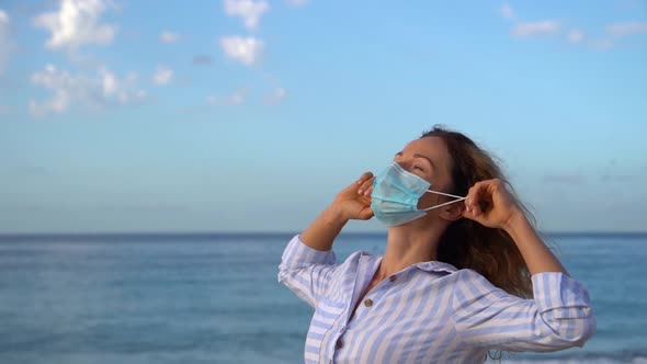 Happy woman wearing medical mask