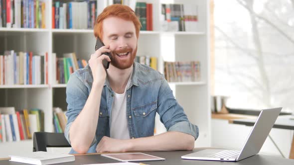 Phone Talk By Casual Redhead Man Discussing