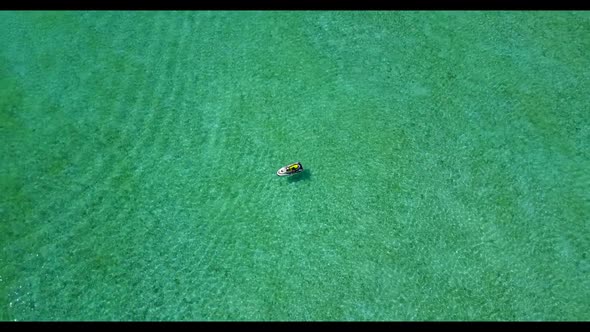 Aerial top down sky of tranquil sea view beach holiday by aqua blue sea with white sand background o