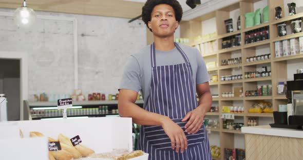 Animation of happy biracial waiter at coffee shop