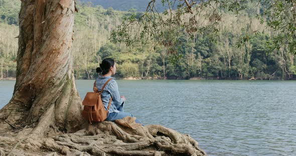 Woman enjoy view of the lake