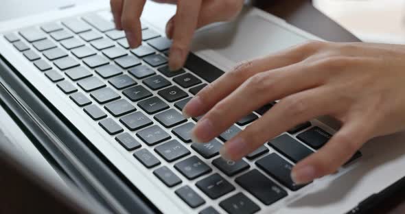 Woman type on laptop computer