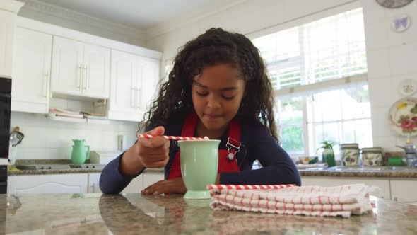 Girl in a kitchen at Christmas time