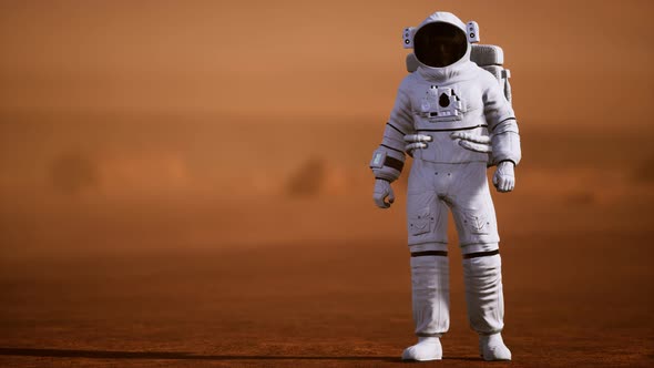 Astronaut on Mars Surface. Red Planet Covered in Gas and Rock