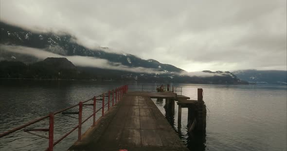 Aerial view of boardwalk over calm ocean near mining area in Squamish