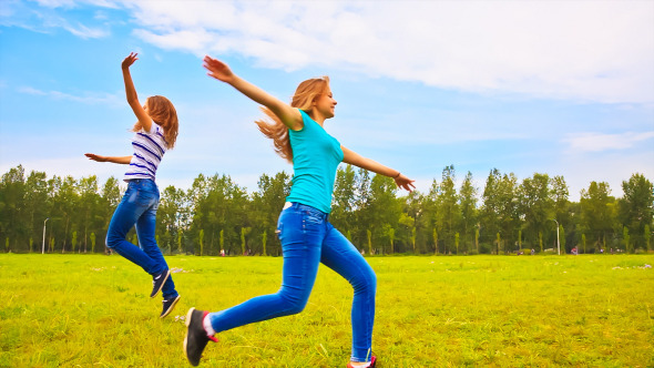 Teens Having Fun on the Meadow