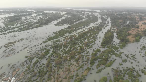 Aerial: flying over Don Det and the 4000 islands Mekong River in Laos