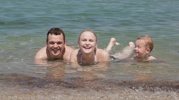 Young Family in the Sea