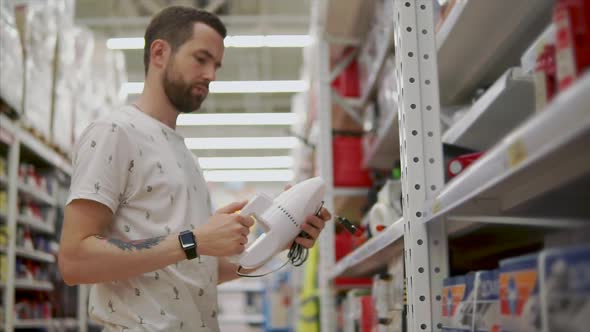 Young Guy Chooses Appliances