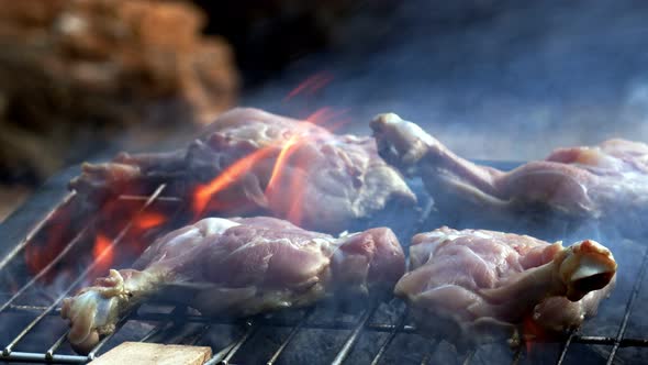 Chicken On Barbecue And Fire 