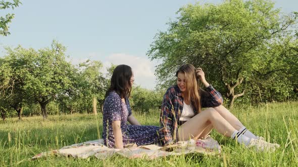 Two Sisters Walk in Nature and Communicate