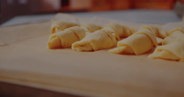 Freshly Made Croissants on Table in Kitchen