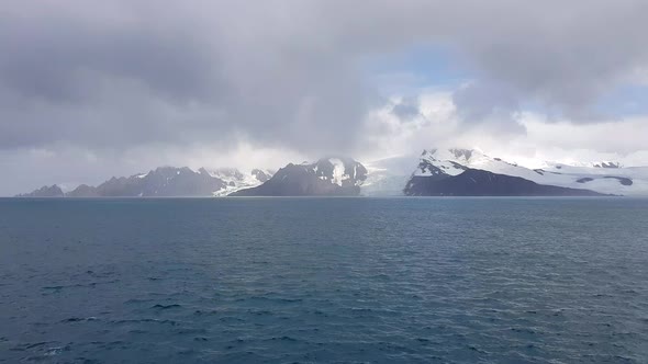 Antarctic Landscape with Icebergs in Foreground