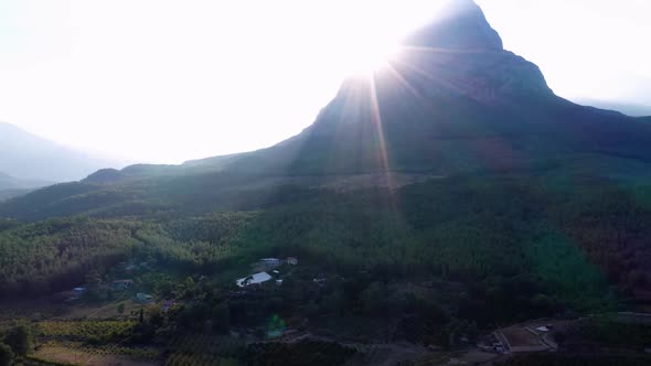 View of Mountain Peak Against Rising Sun