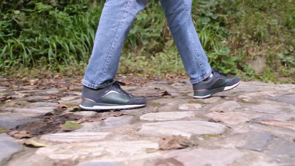 Young Woman Going to Waterfall