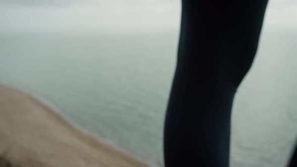 Athletic Woman Body Standing on Beach Closeup