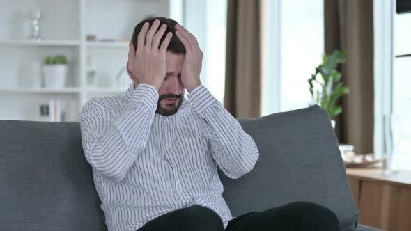 Worried Young Businessman Getting Stressed at Home 