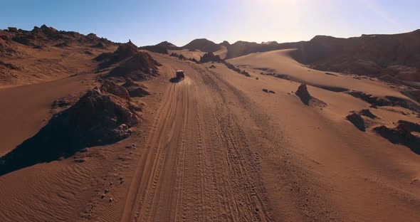 The Car Rides Along a Scenic Road in the Popular Among Tourists Moon Valley in Atacama Desert, Chile