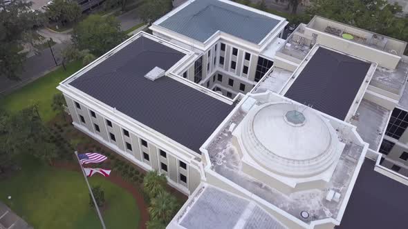 Flying over Florida Supreme Court Building and flag pole, Tallahassee, eagle eye.