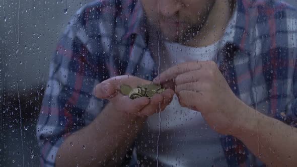 Male Counting Coins in Despair, Suffering Poverty and Unemployment, Depression