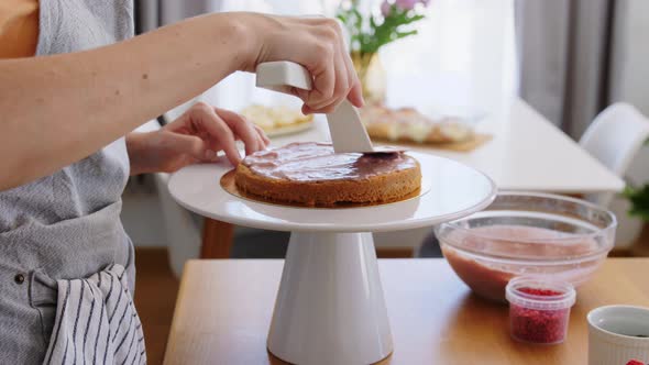 Woman Cooking Food and Baking on Kitchen at Home