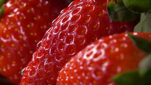 Red Strawberries with Water Flowing Over Surface