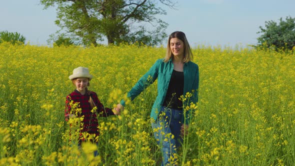 Farmer Family Walk Together Mother and Daughter Holding Hands